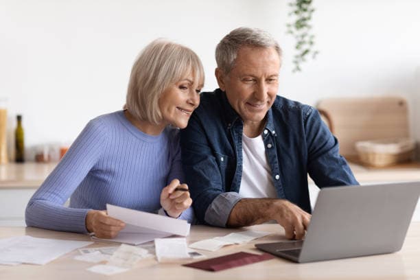 Couple in consultation with their case specialist