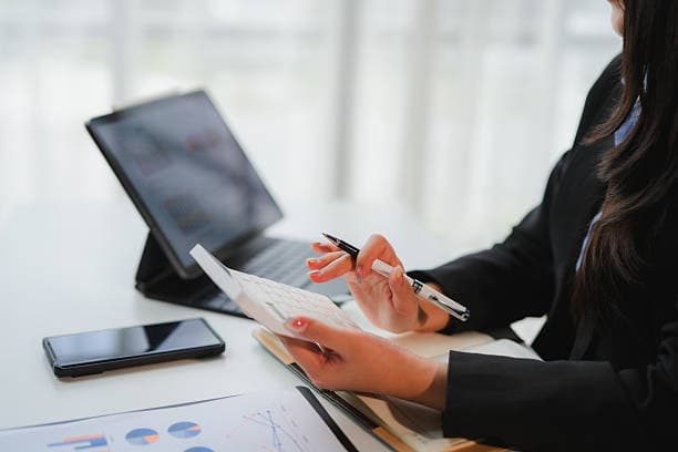 Case specialist preparing and reviewing claim documents